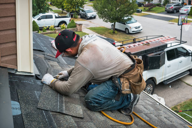 Professional Roofing technician working in New Columbia, PA